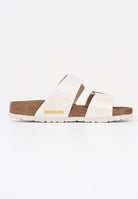 BIRKENSTOCK Ciabatte Sydney Cushion Buckle crema da donna 1030258 . BIRKENSTOCK 