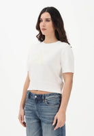 CALVIN KLEIN JEANS Maglia a manica corta panna da donna con logo LV044E306GYBH . CALVIN KLEIN JEANS 