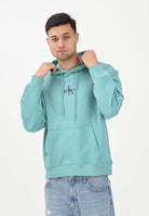 CALVIN KLEIN JEANS Felpa con cappuccio verde acqua da uomo con logo LV04RD243G2IR . CALVIN KLEIN JEANS 