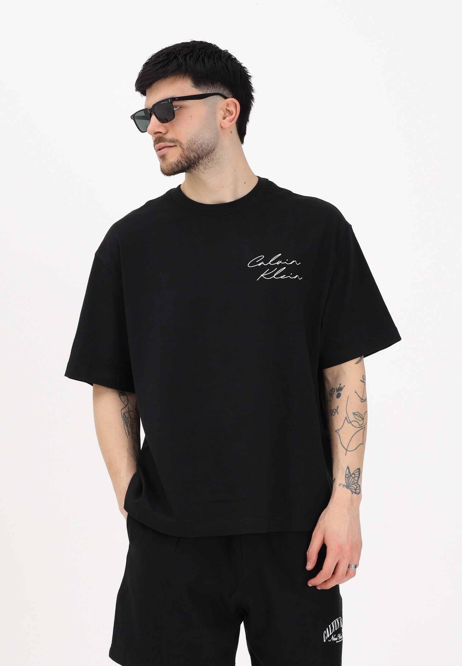 CALVIN KLEIN JEANS T-shirt a manica corta nera da uomo con logo frontale e stampa sul retro LV04RE828G UB1 CALVIN KLEIN JEANS 
