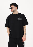 CALVIN KLEIN JEANS T-shirt a manica corta nera da uomo con logo frontale e stampa sul retro LV04RE828G UB1 CALVIN KLEIN JEANS 