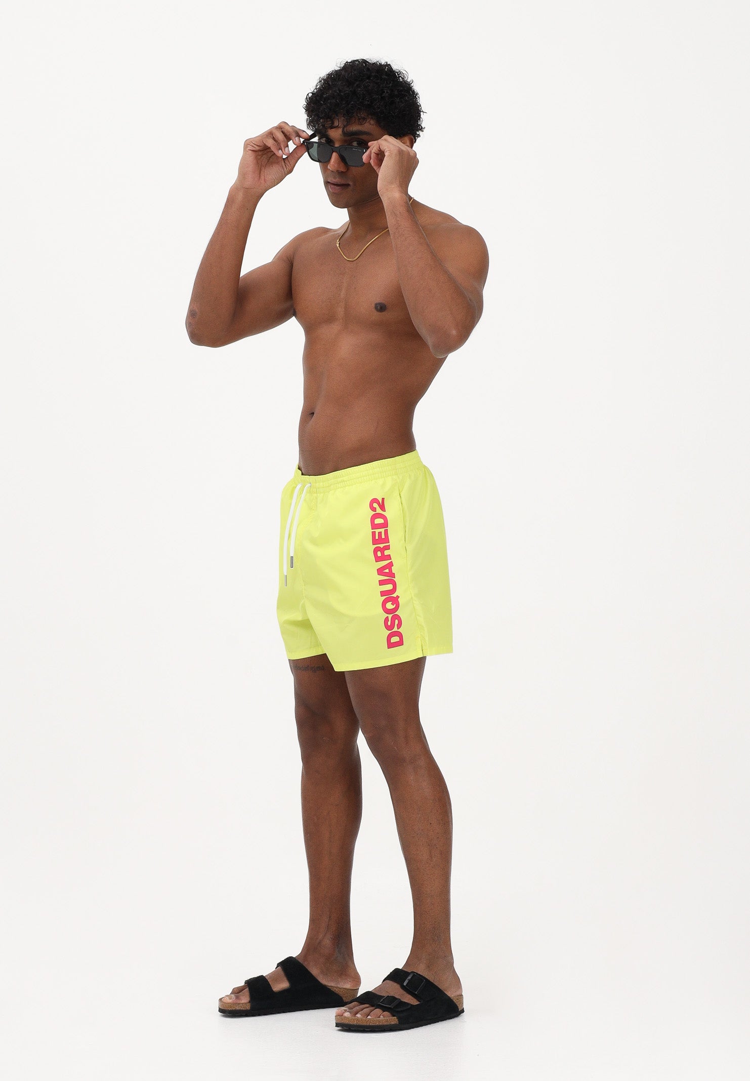 DSQUARED2 Shorts mare giallo da uomo con stampa logo D7B626750 700 DSQUARED2 