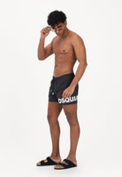DSQUARED2 Shorts mare nero da uomo con logo D7B5C6600 010 DSQUARED2 