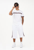 GCDS Shorts sportivo bianco per uomo e donna con bande laterali C1MEQL214F004 100B GCDS 