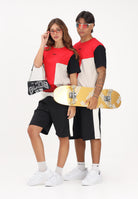 GCDS Shorts sportivo nero per uomo e donna dal design color block C1MEQL215C008 999A GCDS 