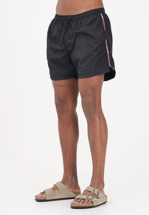 GCDS Shorts mare nero da uomo con bande logate a contrasto C1MEQS244T016 999B GCDS 