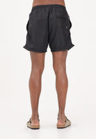 GCDS Shorts mare nero da uomo con bande logate a contrasto C1MEQS244T016 999B GCDS 