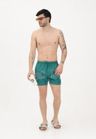 GCDS Shorts mare verde e bianco da uomo con logo C1MEQS249T016 883A GCDS 
