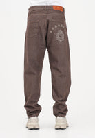 GCDS Jeans marrone da uomo con stampa sul retro C1MWQI191D087 388B GCDS 