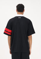 GCDS Polo a manica corta nera per uomo e donna con logo Z0MLQD107J101 999R GCDS 