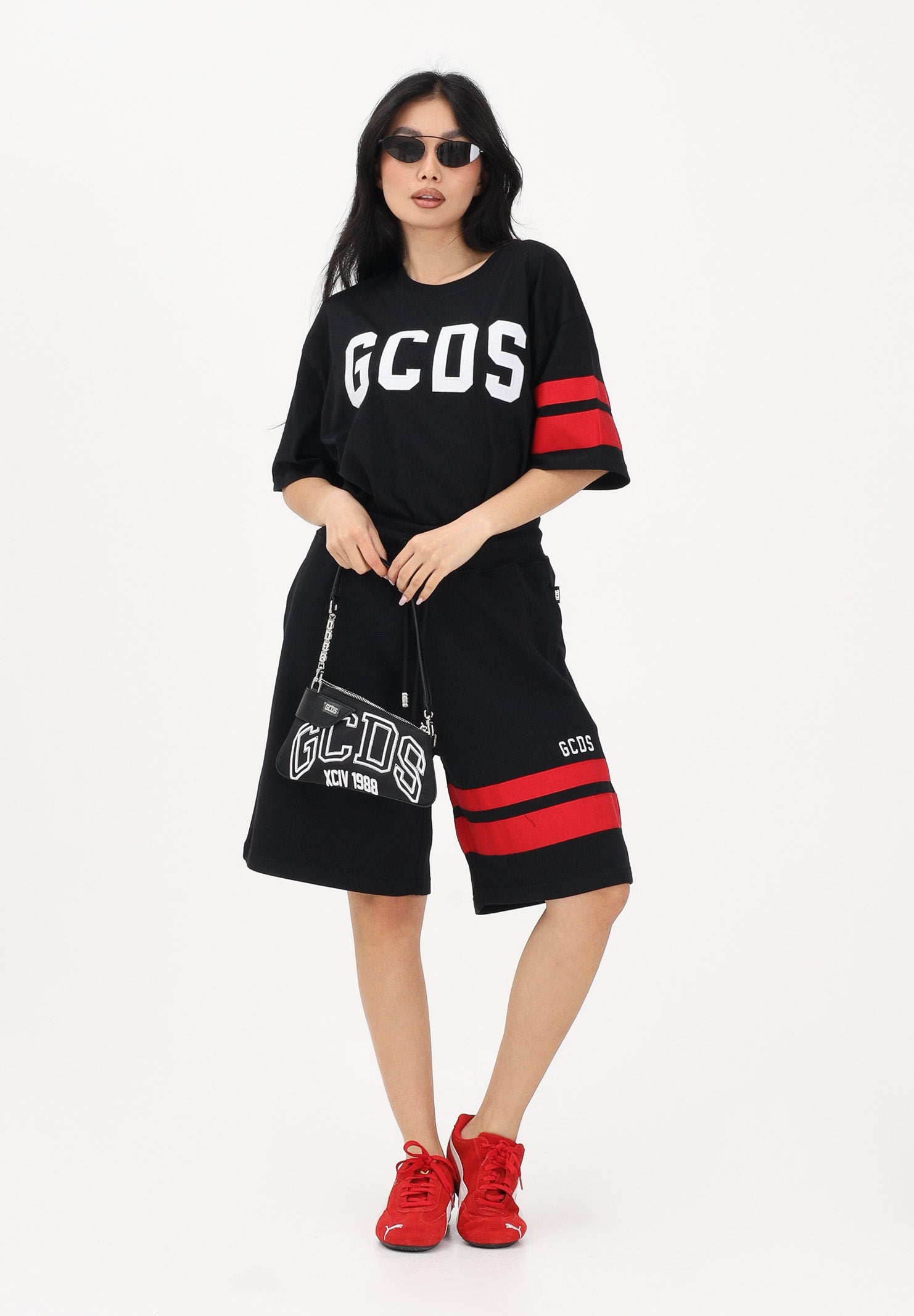 GCDS Shorts sportivo nero per uomo e donna con dettagli a contrasto Z0MLQL229F004 999R GCDS 