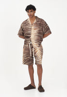 JUST CAVALLI Shorts beige da uomo con stampa animalier effetto tigre 80OADF02CNF06 R83 JUST CAVALLI 