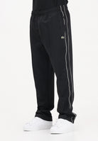LACOSTE Pantalone sportivo nero da uomo in piqué con bordo XH0628 031 LACOSTE 