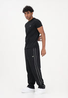 LACOSTE Pantalone sportivo nero da uomo in piqué con bordo XH0628 031 LACOSTE 