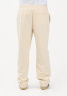 LACOSTE Pantalone sportivo crema da uomo in piqué con bordo XH0628 056 LACOSTE 