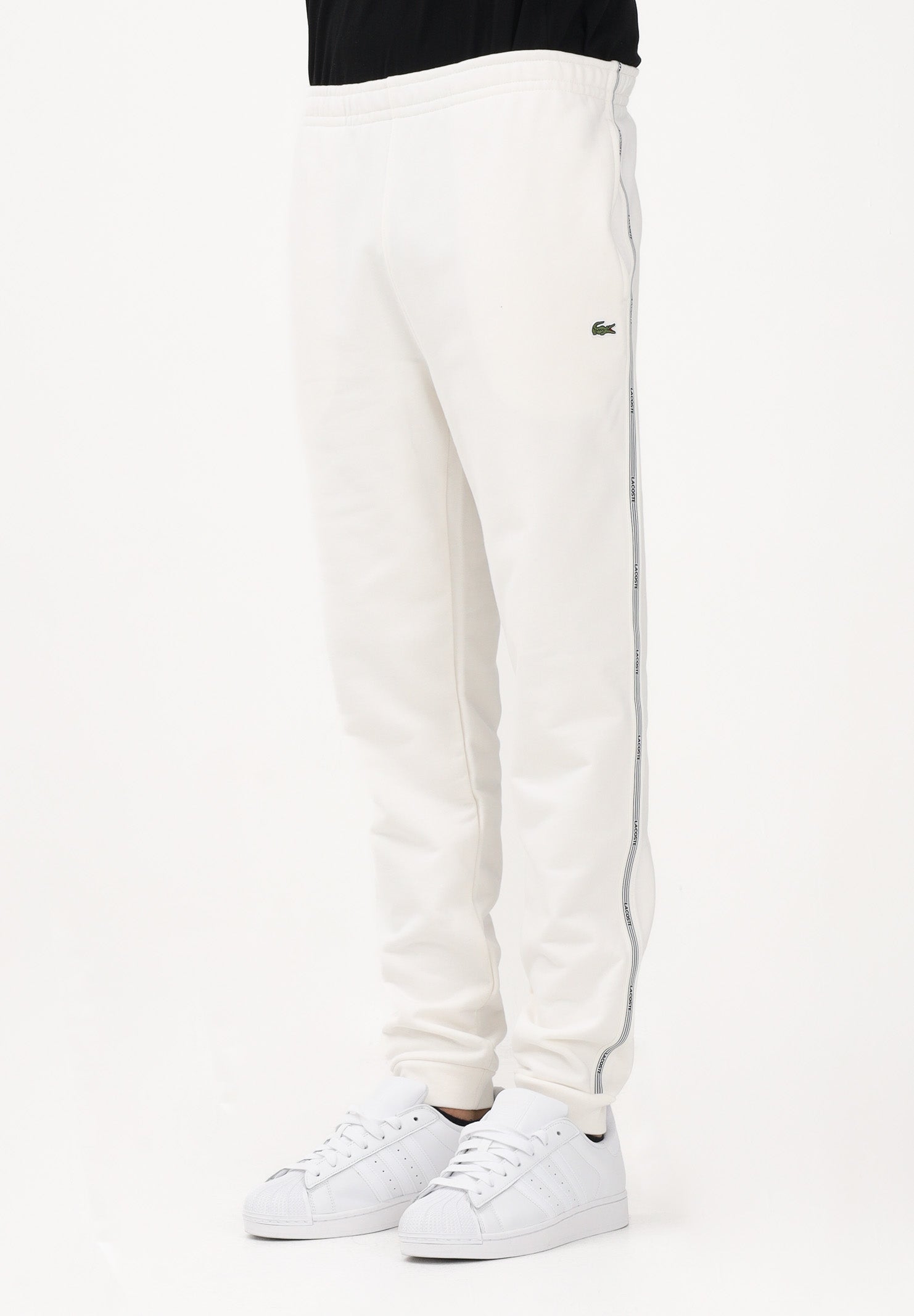 LACOSTE Pantalone sportivo bianco da uomo con rifiniture laterali logate XH0883 70V LACOSTE 