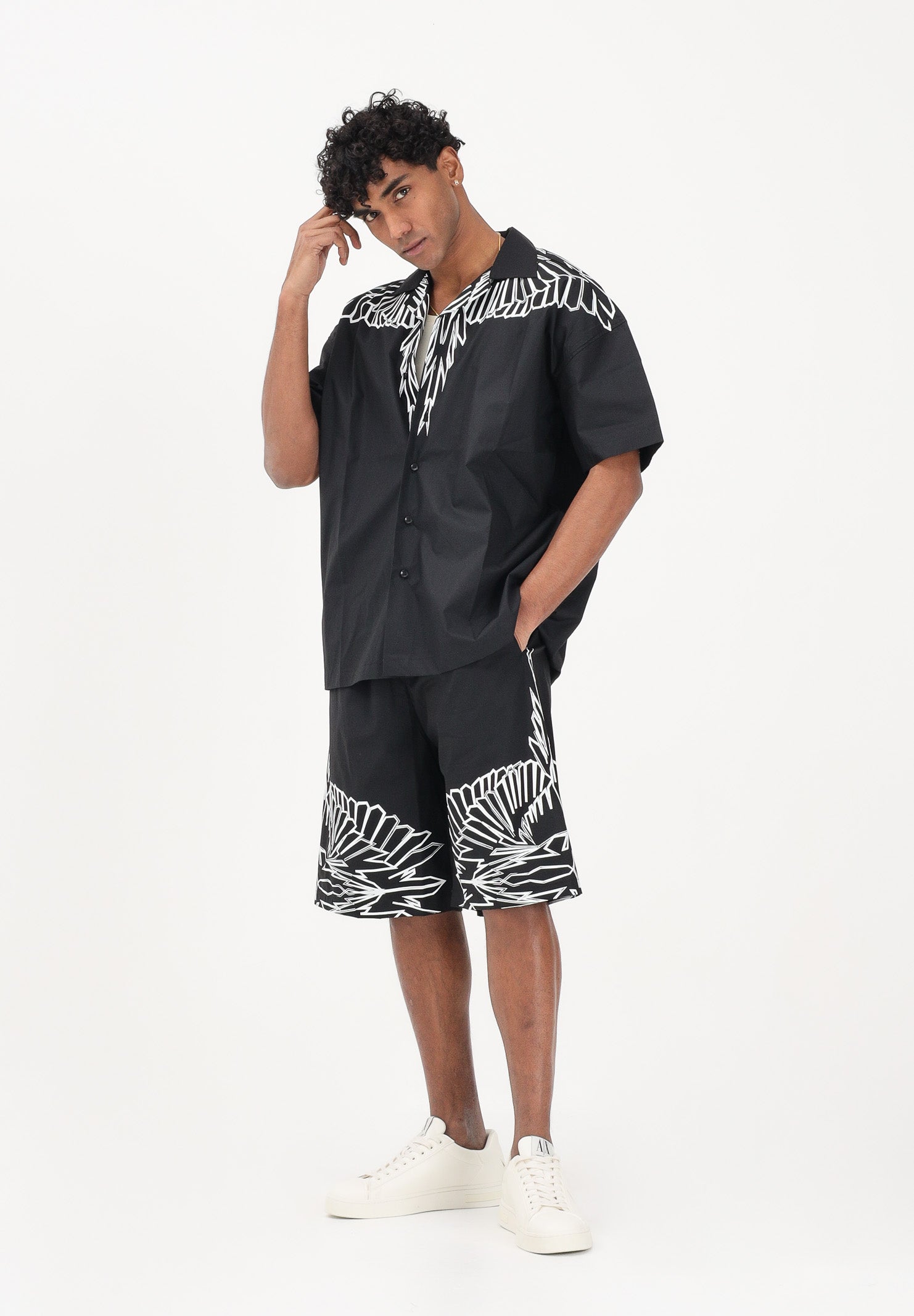 MARCELO BURLON COUNTY OF MILAN Shorts casual nero da uomo con stampa grafica S6CMMABE012 110 MARCELO BURLON COUNTY OF MILAN 