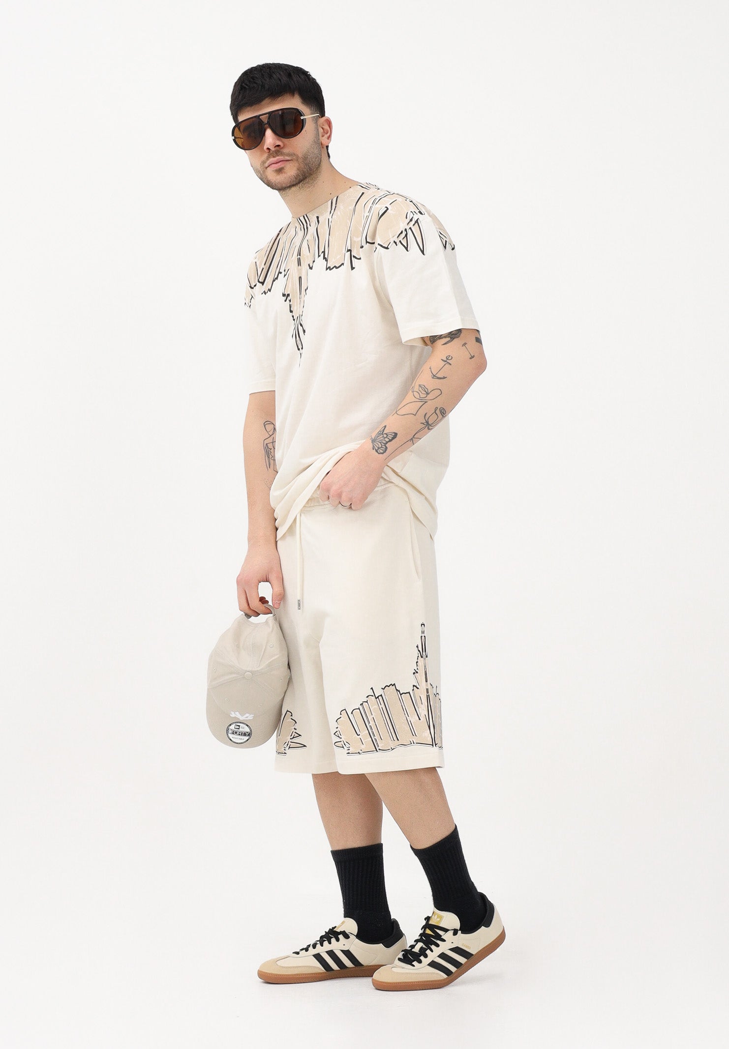 MARCELO BURLON COUNTY OF MILAN Shorts sportivo panna da uomo con stampa S6CMMABE018 412 MARCELO BURLON COUNTY OF MILAN 