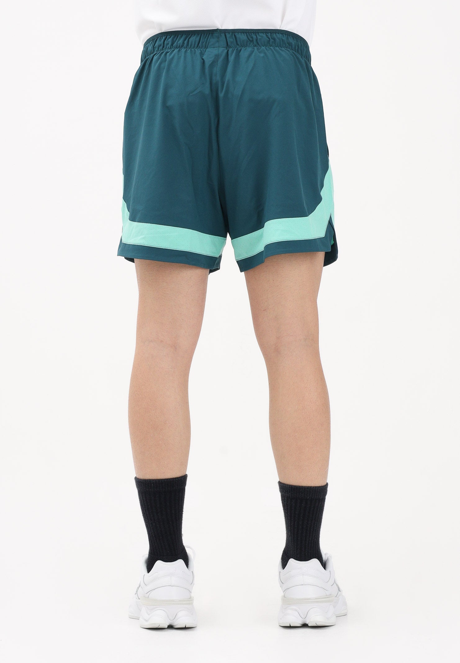 NEW BALANCE Shorts sportivo TOURNAMENT NOVELTY verde da uomo MB6120HXAAV . NEW BALANCE 