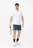 NEW BALANCE Shorts sportivo TOURNAMENT NOVELTY verde da uomo MB6120HXAAV . NEW BALANCE 