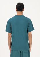 NEW BALANCE T-shirt a manica corta Sport Essentials petrolio per uomo e donna MT41509AAV . NEW BALANCE 