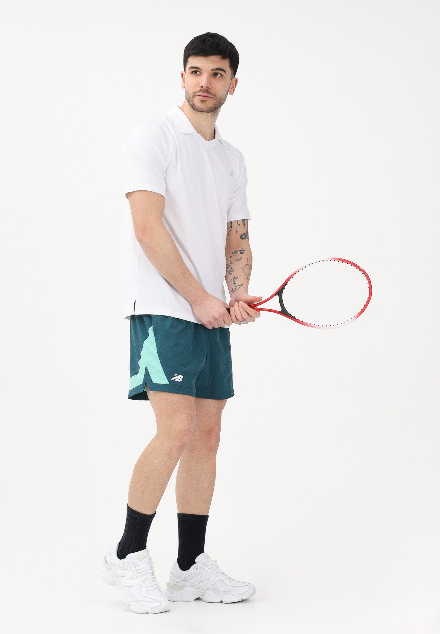NEW BALANCE Polo a manica corta Tournament Dry bianca da uomo MT61W0HTWT . NEW BALANCE 