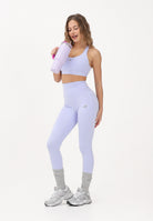NEW BALANCE Bralette sportiva NB Essential lilla da donna WB51035DYK . NEW BALANCE 