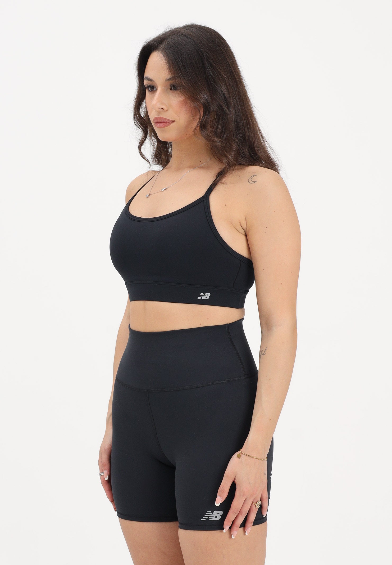 NEW BALANCE Top sportivo NB Essential nero da donna WB51039BK . NEW BALANCE 