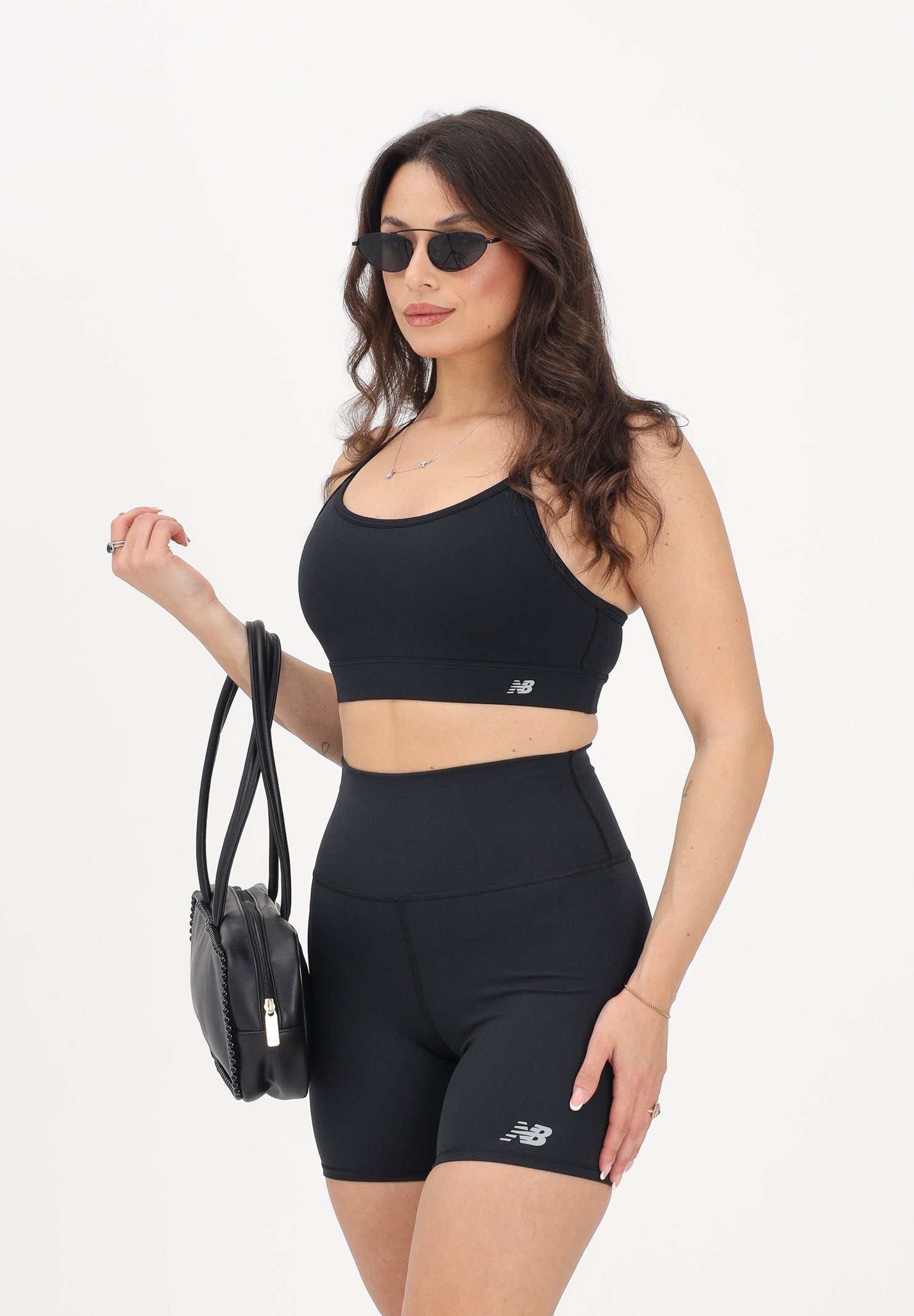 NEW BALANCE Top sportivo NB Essential nero da donna WB51039BK . NEW BALANCE 