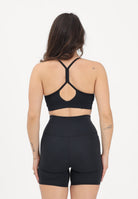 NEW BALANCE Top sportivo NB Essential nero da donna WB51039BK . NEW BALANCE 