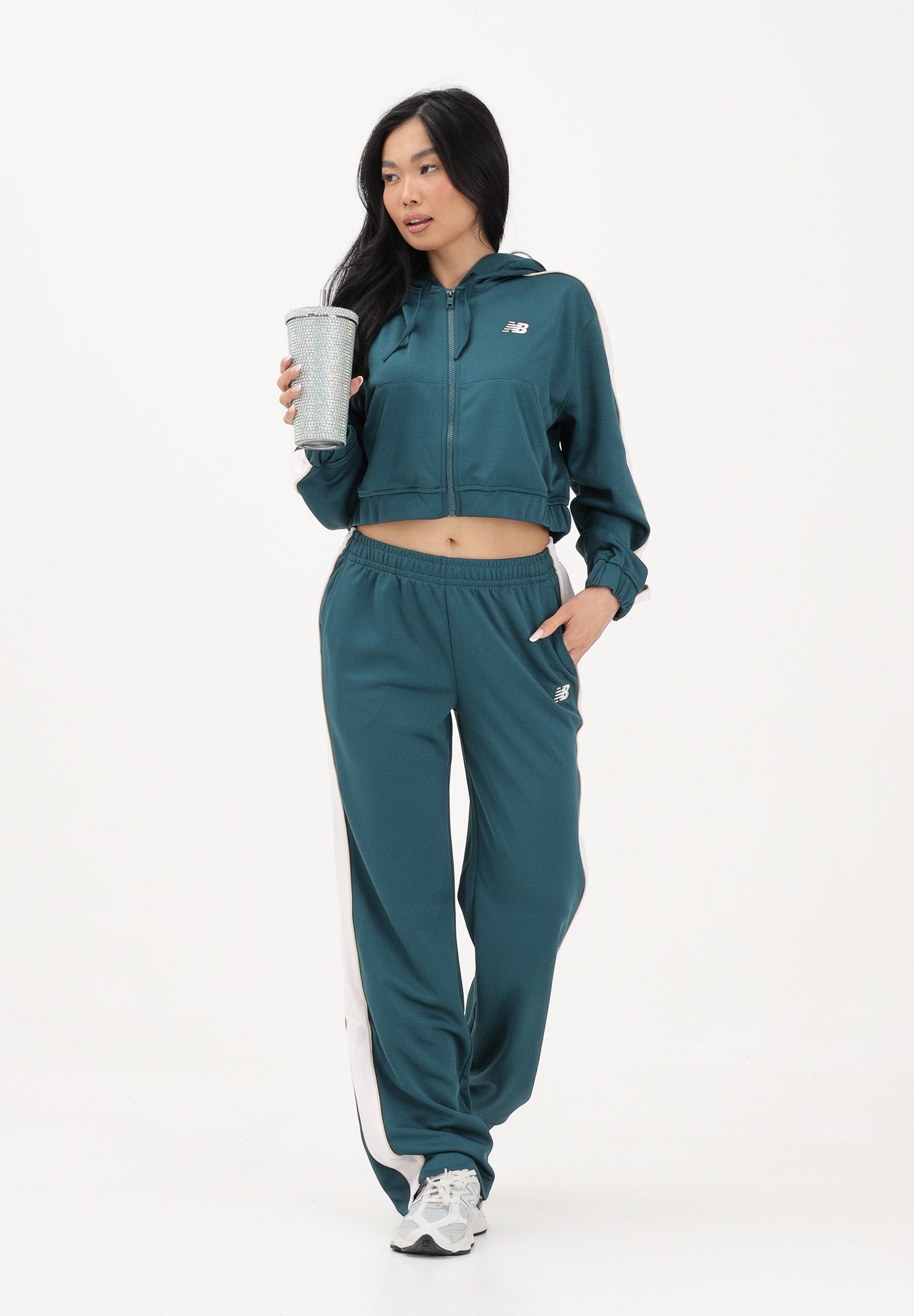 NEW BALANCE Pantalone sportivo Interlock verde da donna WB61Q2R4AAV . NEW BALANCE 