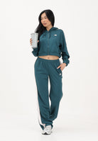 NEW BALANCE Pantalone sportivo Interlock verde da donna WB61Q2R4AAV . NEW BALANCE 