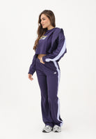 NEW BALANCE Pantalone sportivo Interlock viola da donna WB61Q2R4BOY . NEW BALANCE 