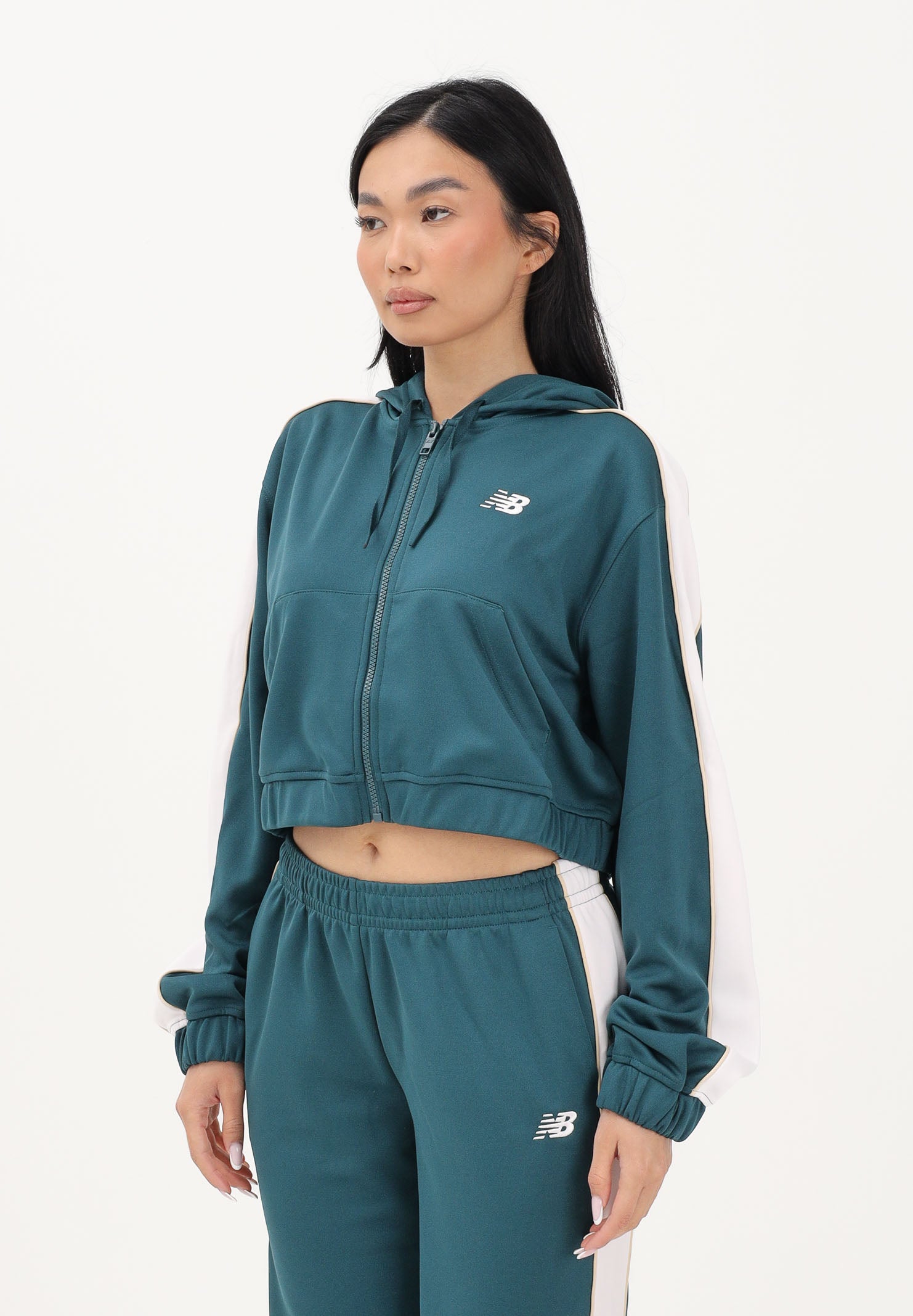 NEW BALANCE Felpa con zip Interlock verde da donna WJ61B759AAV . NEW BALANCE 