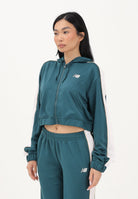 NEW BALANCE Felpa con zip Interlock verde da donna WJ61B759AAV . NEW BALANCE 