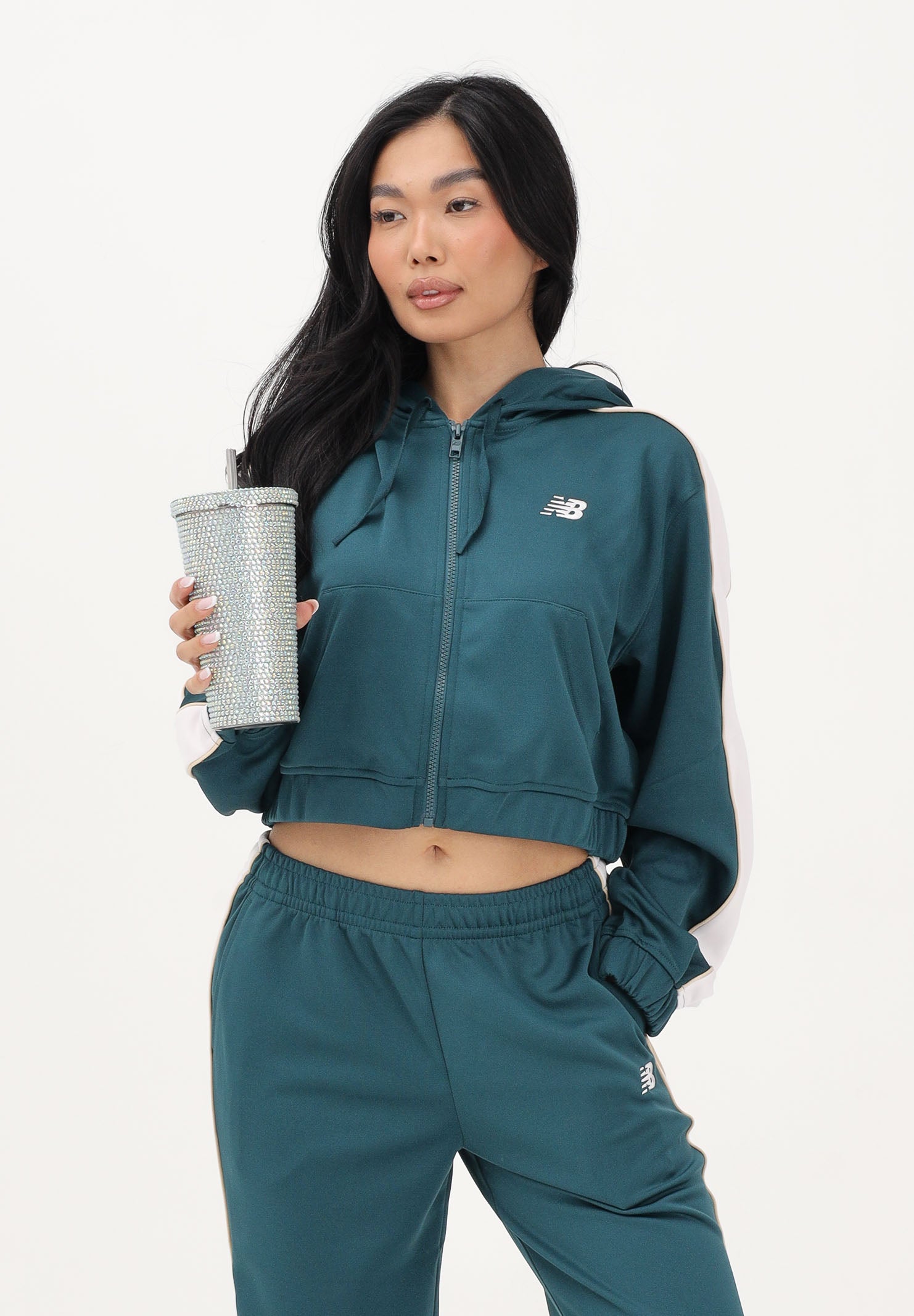 NEW BALANCE Felpa con zip Interlock verde da donna WJ61B759AAV . NEW BALANCE 