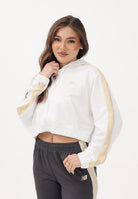 NEW BALANCE Felpa con zip Interlock bianca da donna WJ61B759SST . NEW BALANCE 