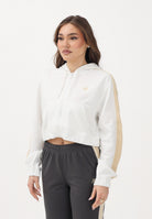 NEW BALANCE Felpa con zip Interlock bianca da donna WJ61B759SST . NEW BALANCE 