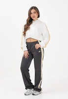 NEW BALANCE Felpa con zip Interlock bianca da donna WJ61B759SST . NEW BALANCE 