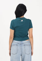 NEW BALANCE Polo a manica corta ottanio da donna WT61S8TLAAV . NEW BALANCE 