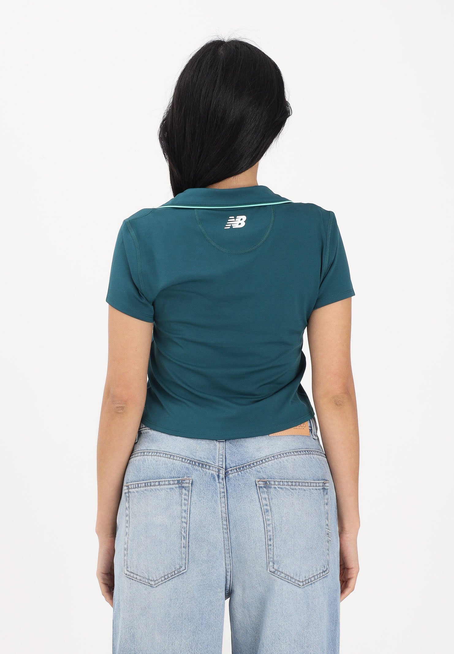NEW BALANCE Polo a manica corta ottanio da donna WT61S8TLAAV . NEW BALANCE 