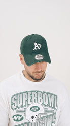 NEW ERA Cappello con visiera 9TWENTY Oakland Athletics Distressed verde per uomo e donna 60595227 . NEW ERA 