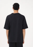 NEW ERA T-shirt a manica corta Oversized Chicago Bulls NBA League Essential nera per uomo e donna 60771515 . NEW ERA 