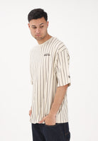 NEW ERA T-shirt a manica corta Oversized New Era Pinstripe panna per uomo e donna 60771551 . NEW ERA 