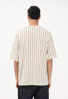 NEW ERA T-shirt a manica corta Oversized New Era Pinstripe panna per uomo e donna 60771551 . NEW ERA 