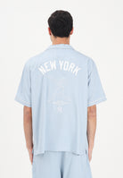 NEW ERA Camicia a manica corta MLB Graphic Revere New York Yankees celeste per uomo e donna 60856138 . NEW ERA 