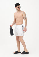 NIKE Shorts mare bianco da uomo con banda laterale logata NESSG555 100 NIKE 