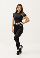 PUMA Leggings W STRONG CROSS FRONT TIGHT 7/8 nero da donna 528498 01 PUMA 
