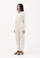 PUMA Tuta sportiva Ess+ Animal FZ panna da donna<BR/> 694708 87 PUMA 