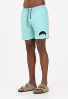 SPRAYGROUND Shorts mare verde acqua da uomo con patch shark SP925AQUA . SPRAYGROUND 